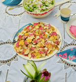 Beetroot, apple and kohlrabi salad served on large bamboo platter
