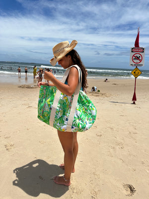 
                  
                    large colourful printed cotton bag on girl at the beach 
                  
                