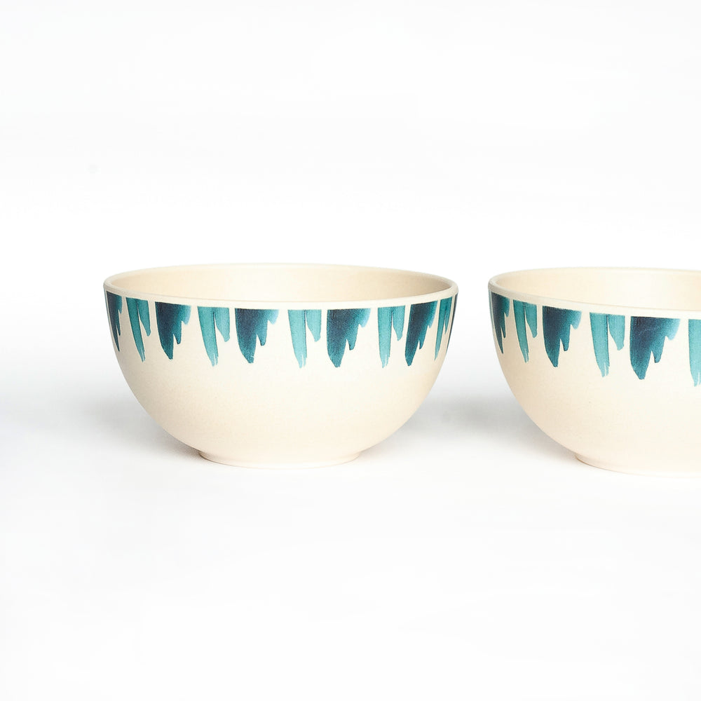 
                  
                    small bamboo bowl with blue wave design
                  
                