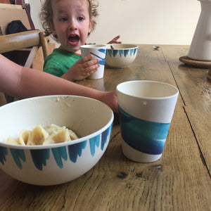 
                  
                    pasta bowls with blue wave design
                  
                