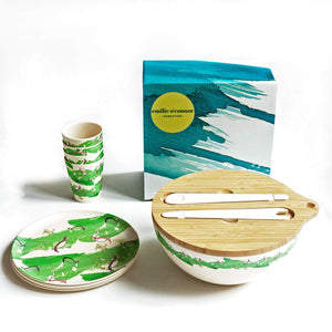 
                  
                    dinner set of large salad bowl with wooden lid and servers, four small 22cm plates, four cups stacked and gift box , made from bamboo fibre and all decorated in green turtle print
                  
                