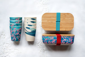 
                  
                    bamboo cups set in pink coral and blue wave  designs with bamboo lunch boxes
                  
                