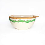 Large green bowl with wooden lid